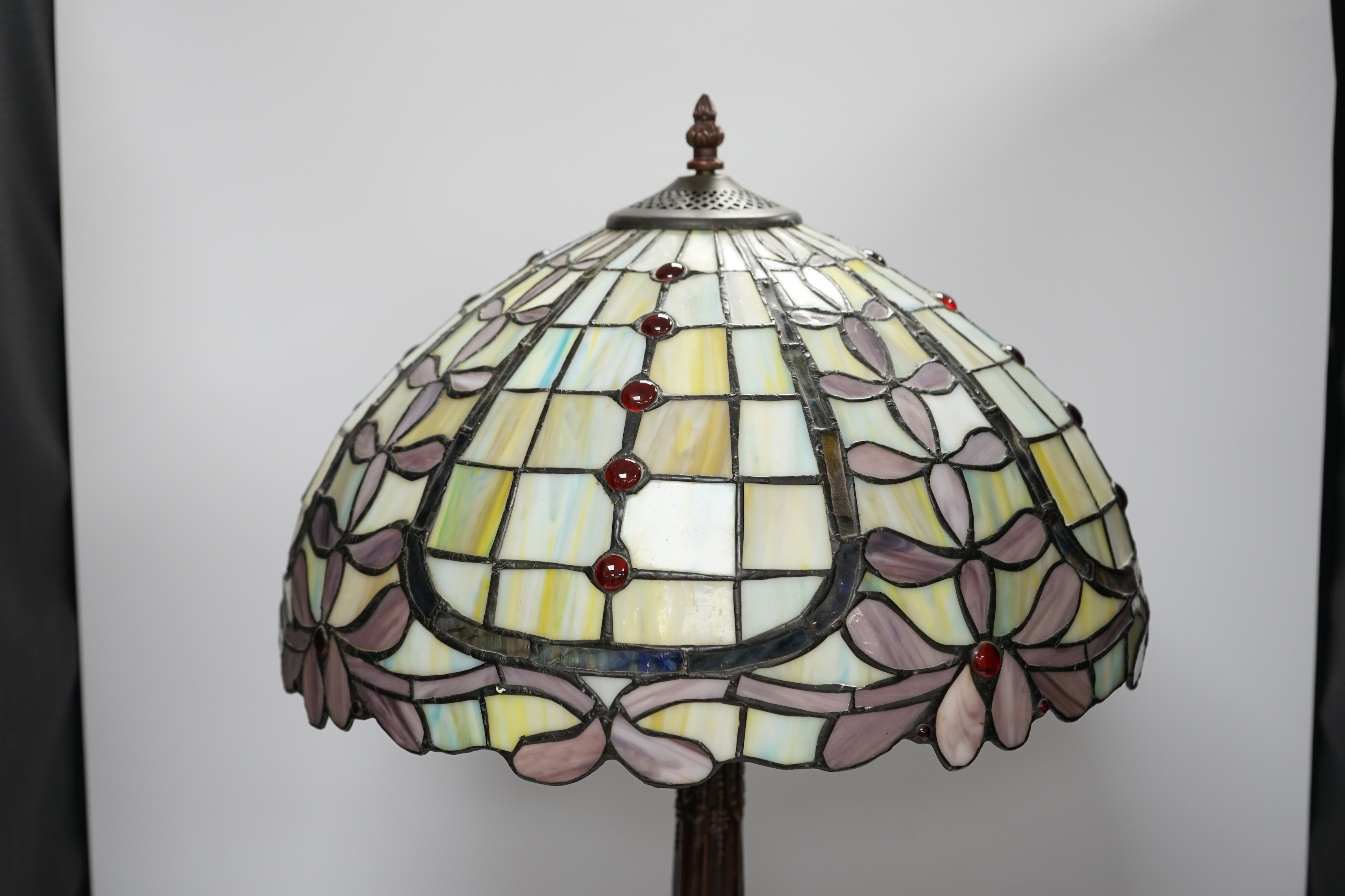 A reproduction Tiffany style table lamp, approximately 60cm high. Condition - good